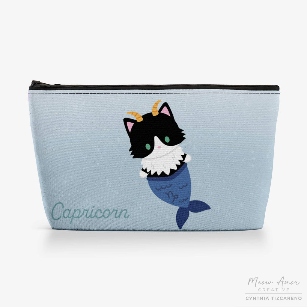 Pouch with a capricorn zodiac design on a light blue background
