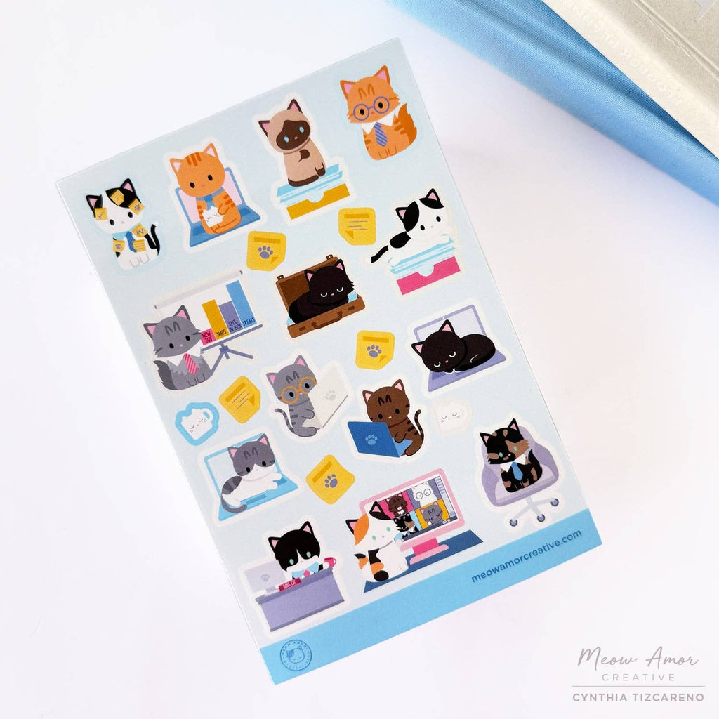 Sheet of cat-themed stickers with various designs on a white background