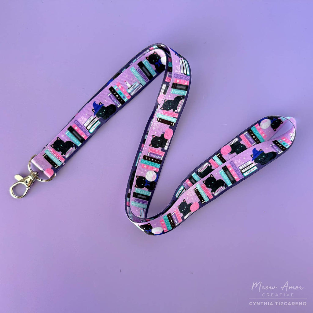 Lanyard with cat pattern on a purple background