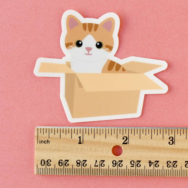 Orange Cat Sitting in Cardboard Box sticker