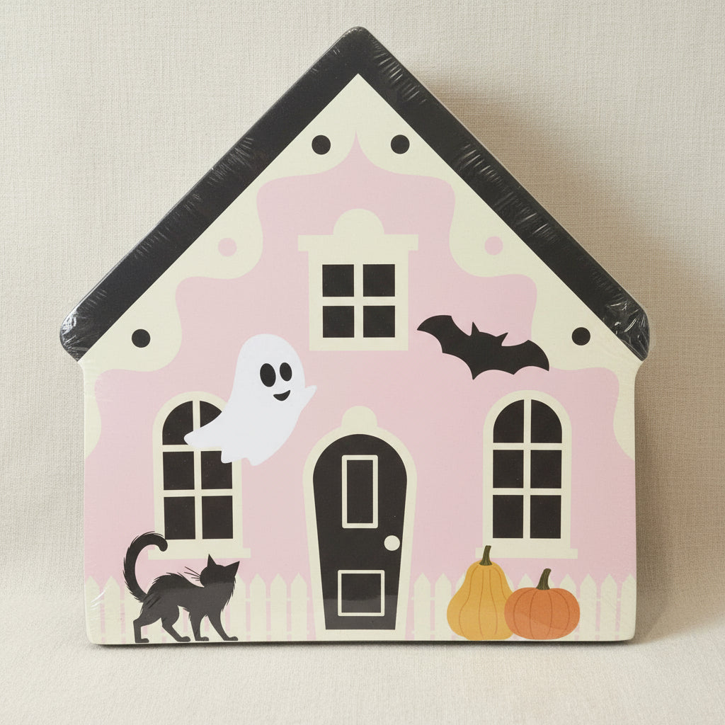 Halloween-themed cardboard scratcher against a plain background