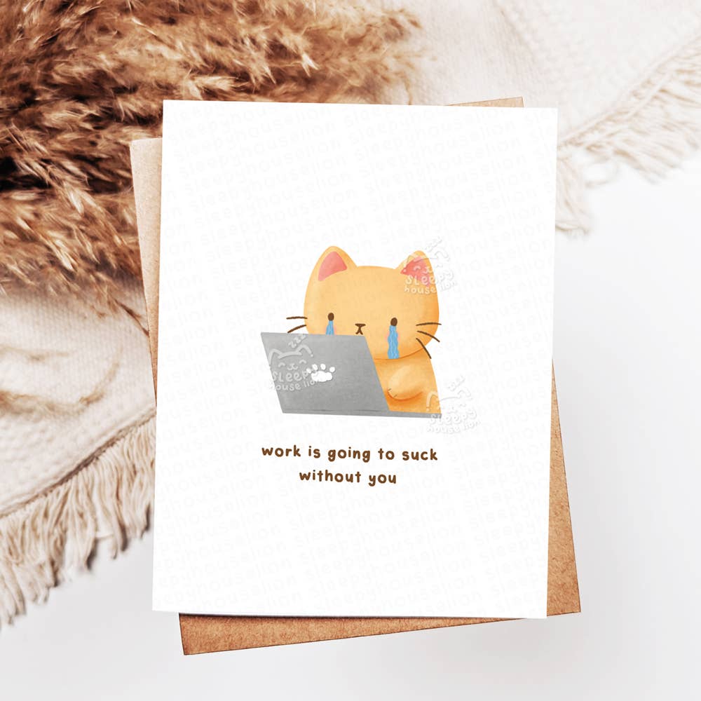 Greeting card with a cartoon cat holding a laptop and text 'work is going to suck without you' on a textured surface.