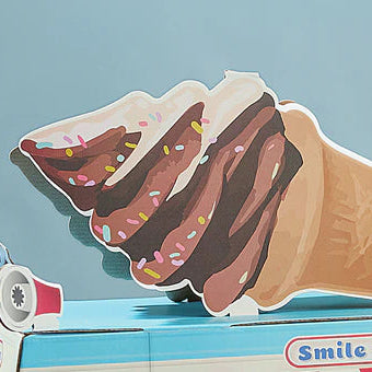 Close-up of cardboard ice cream truck topper