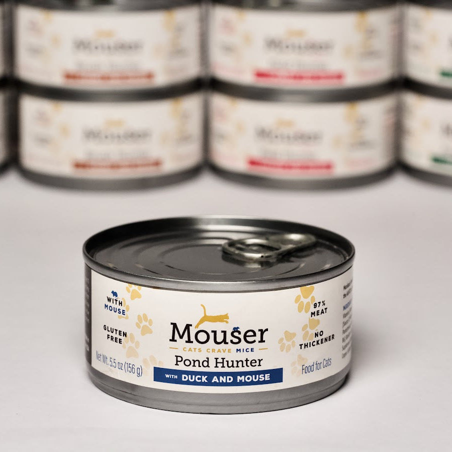 Mouser canned pet food can on a white background with multiple cans in the background.