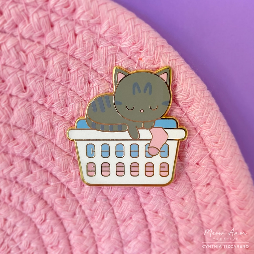 Sleepy Laundry Cat enamel pin