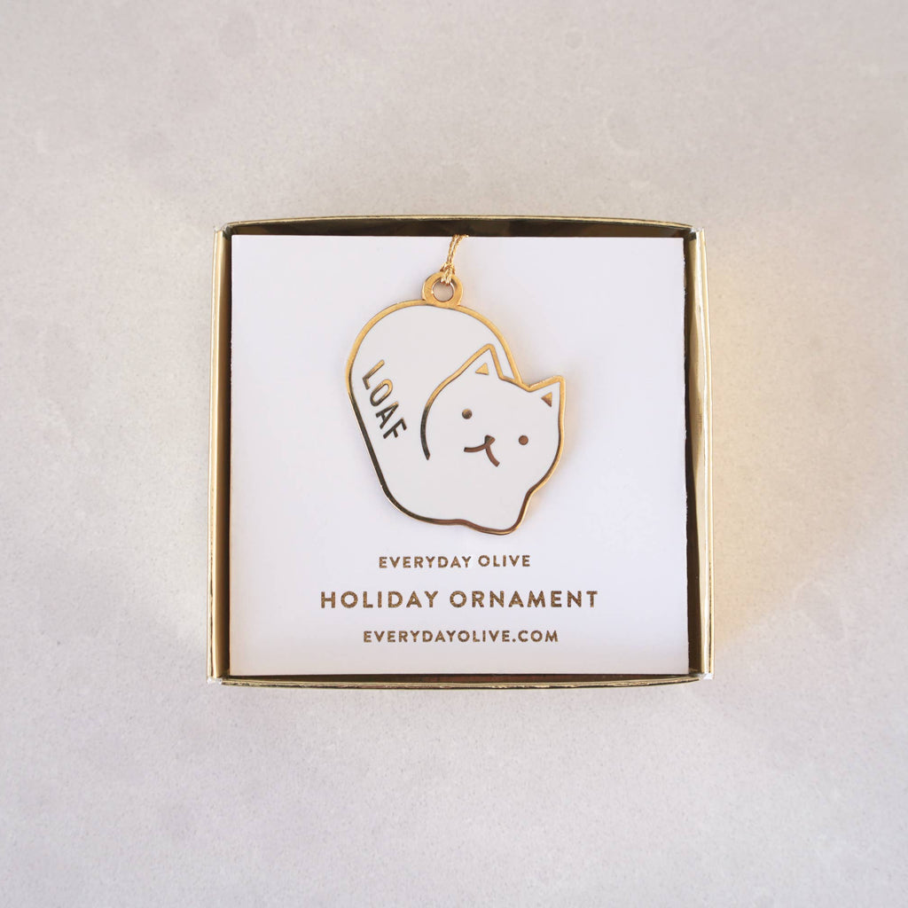 Cat-shaped ornament on a white card with 'Everyday Olive' branding on a light gray background