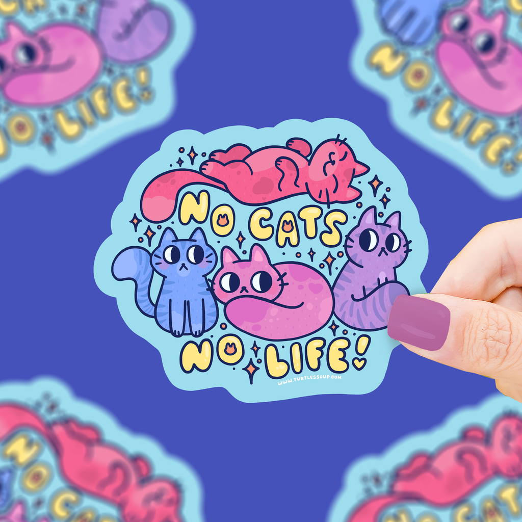 Sticker with cartoon cats and 'No Cats No Life!' text held by a hand on a blue background.