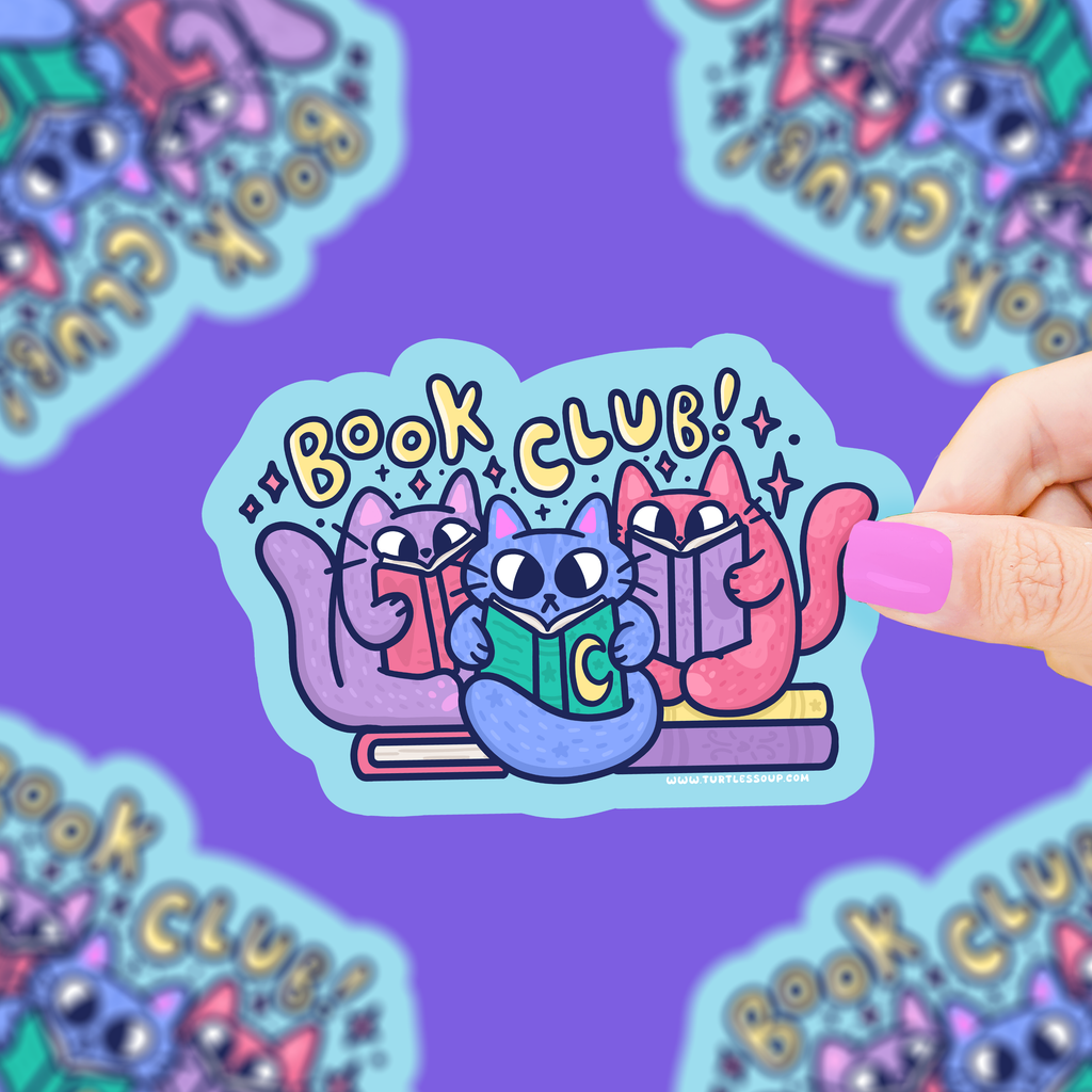 Sticker with cartoon cats reading books and 'Book Club!' text on a purple background.