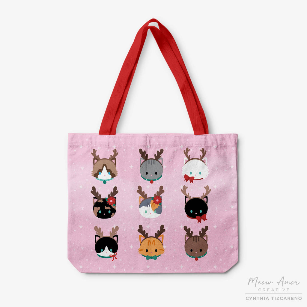 Tote bag with cat-themed reindeer design on a pink background