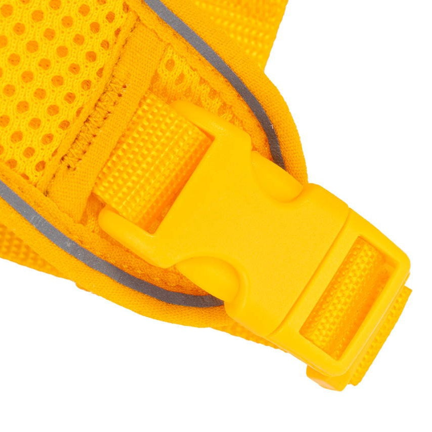 Close-up of a yellow cat harness with reflective stripes on a white background
