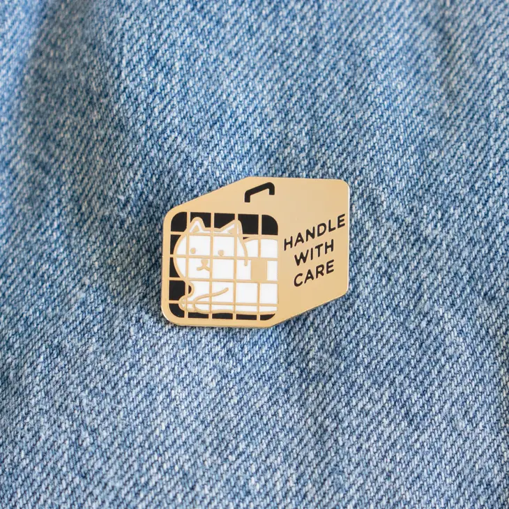 Handle with Care enamel pin