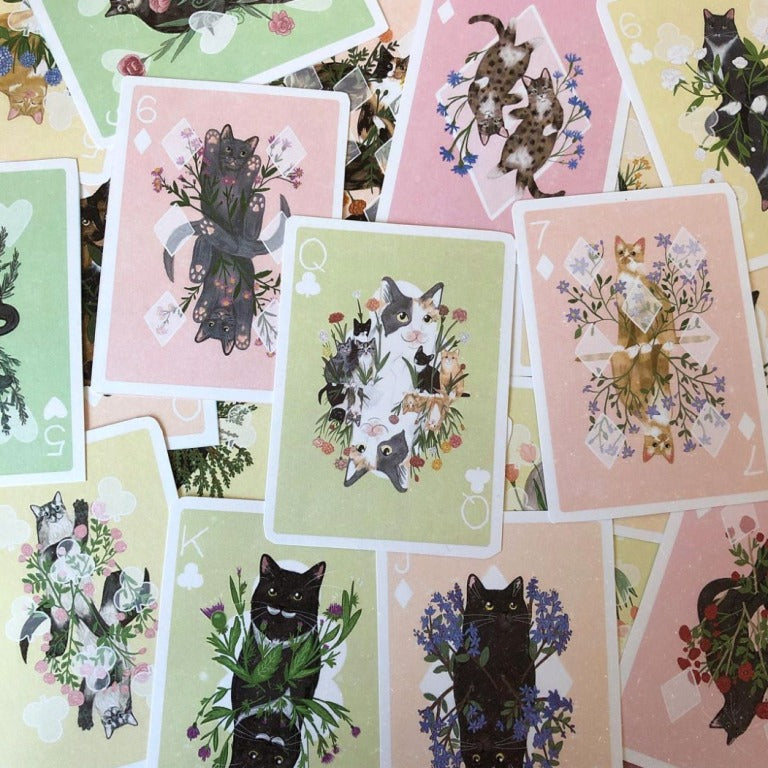 Considerate Cat playing cards