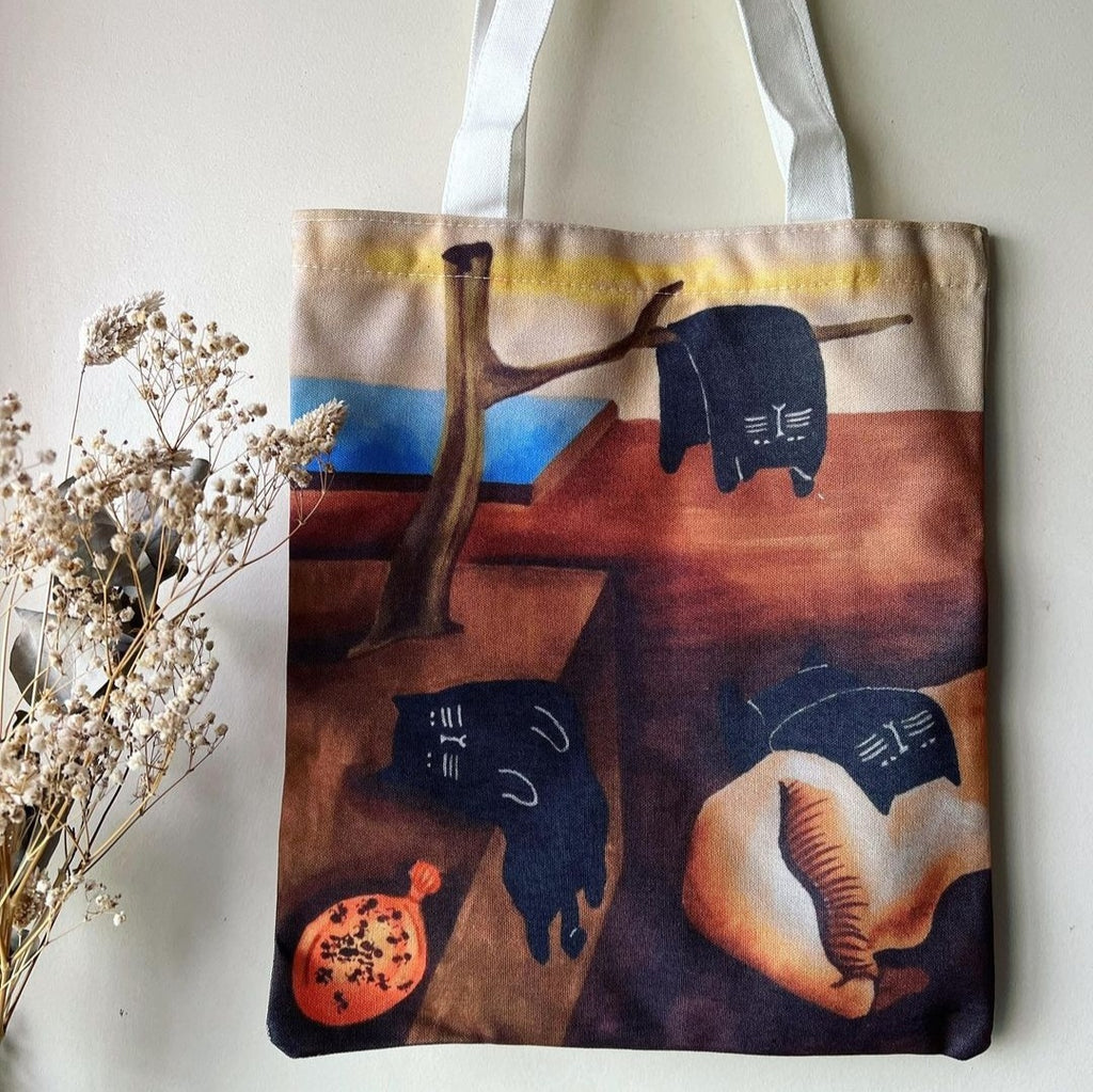 The Purrsistence of Memory tote bag