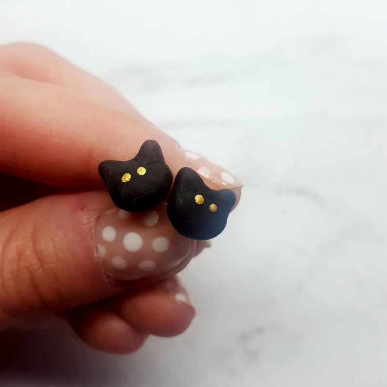 Cat head stud earrings